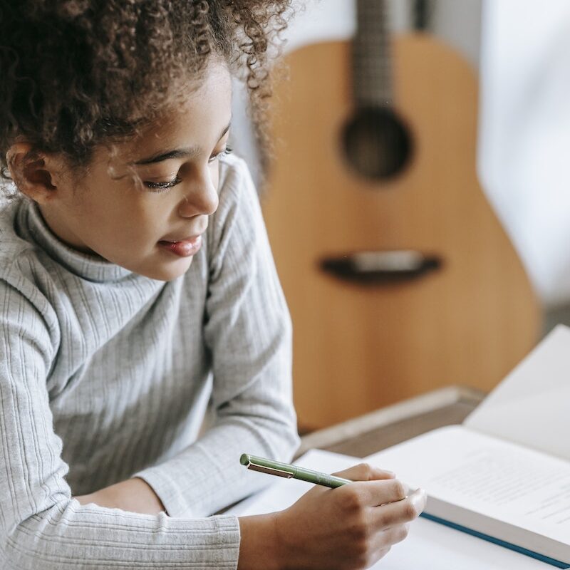 girl writing in a journal - ooh lovely journals